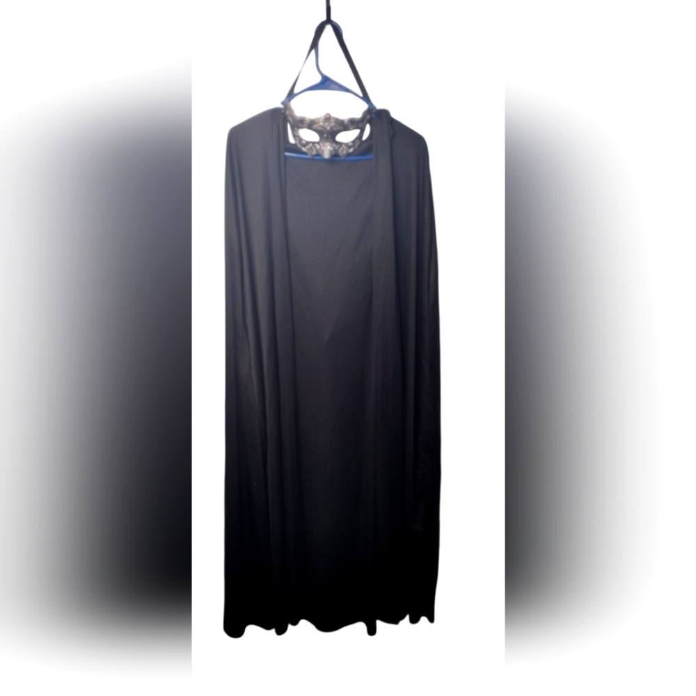 Black cape and sliver mask